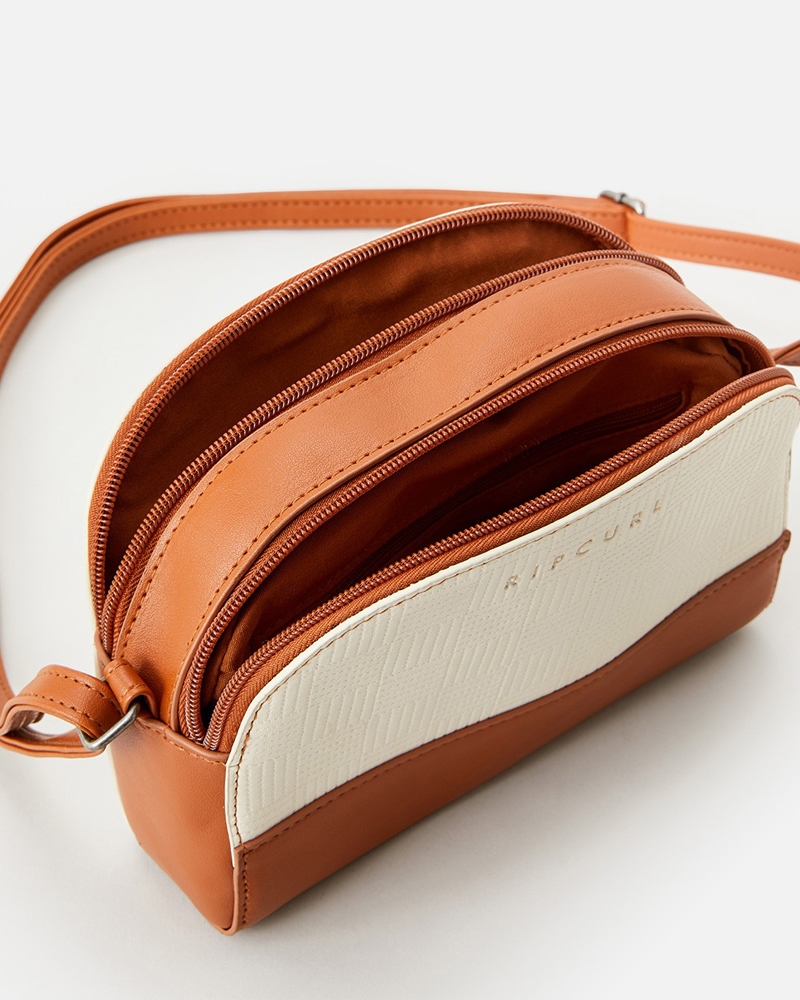 next tan bolsa